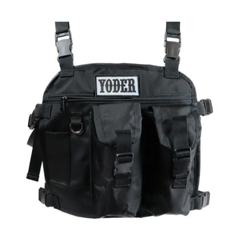 A black Yoder 2 pocket chest pack with adjustable straps and multiple compartments.