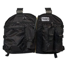 A black Yoder strap accessory vest with multiple pockets and pouches, featuring an open-air construction and adjustable fit.